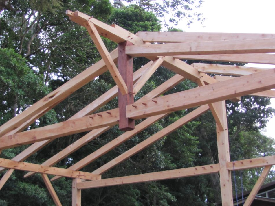 One truss up, four to go in the timber frame meetinghouse in the Quaker town of Monteverde, Costa Rica