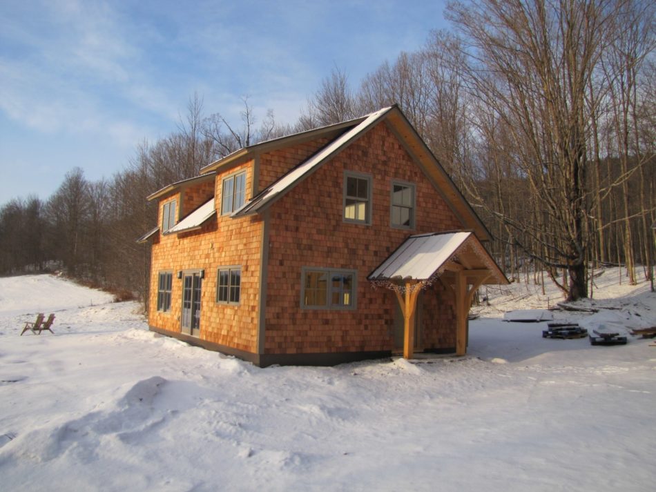 finished timber frame house in Vermont with cedar shingles