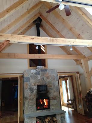 fireplace in a timber frame great room