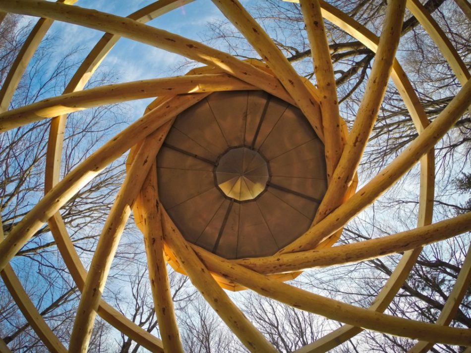 A spiral of spruce beams in a reciprocating pavilion