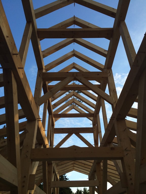Timber frame rafter peaks with pegs