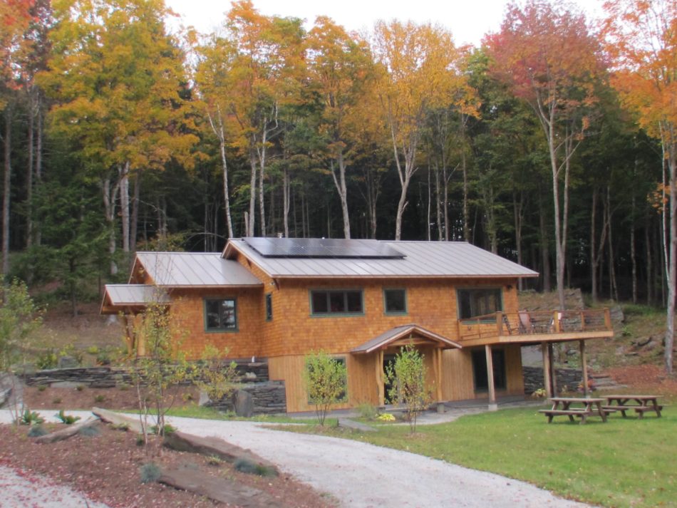 New home with cedar shingles and photovoltaics