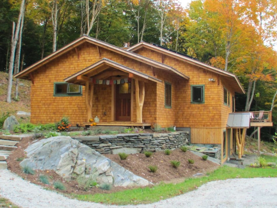 A finished home in Central Vermont with cedar shingles and covered entries