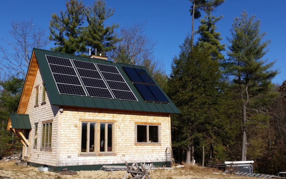 Solar installation on a  post and beam cabin in New Hampshire