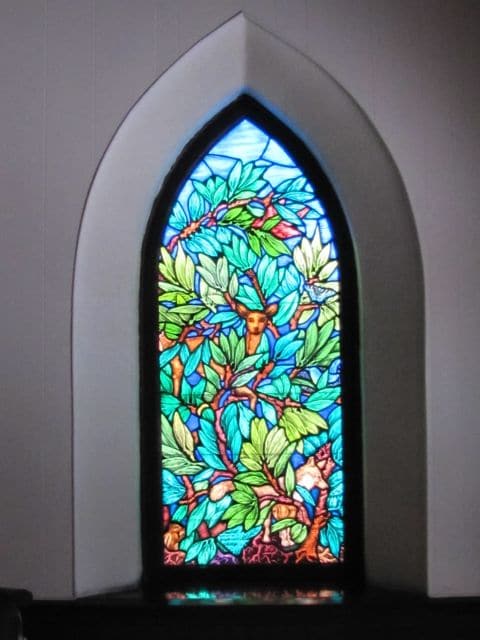 Stained glass in Timberframed church