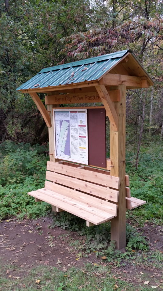 Trailhead kiosk with cedar bench