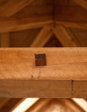 A detailed photo of a wedged scarf joint