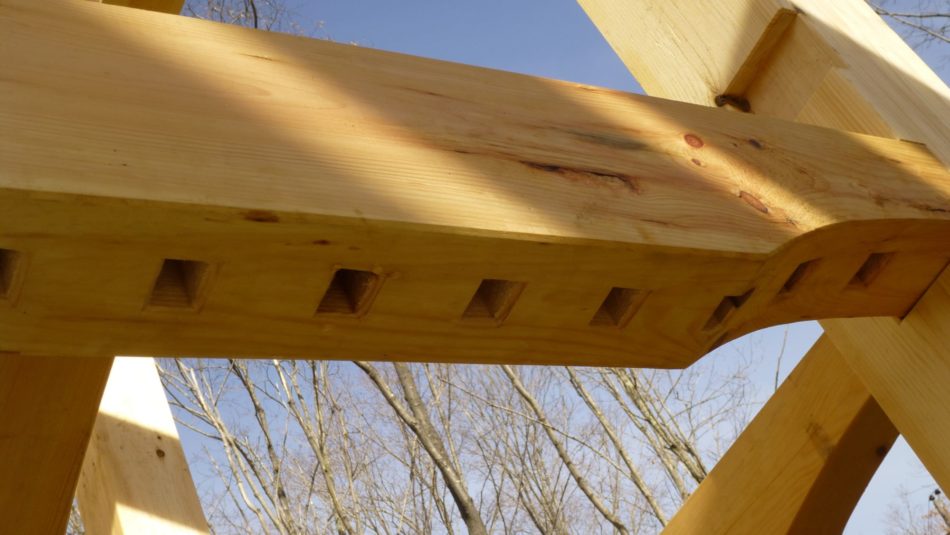 A timber joist with mortises for stair balusters