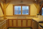 Cabinetry just installed in a finished timber frame home