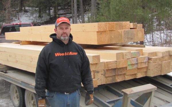 Our sawyer Mike Gendron with a load of white pine timbers