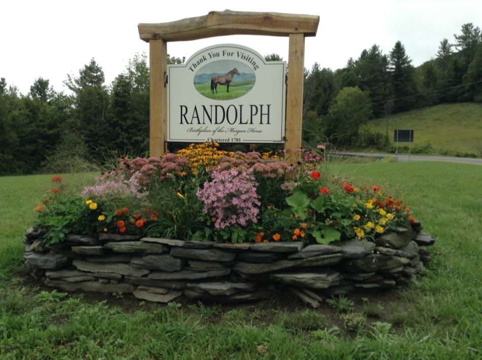 Garden club of Randolph, VT planted a beautiful display in front of the Timber Frame welcome sign