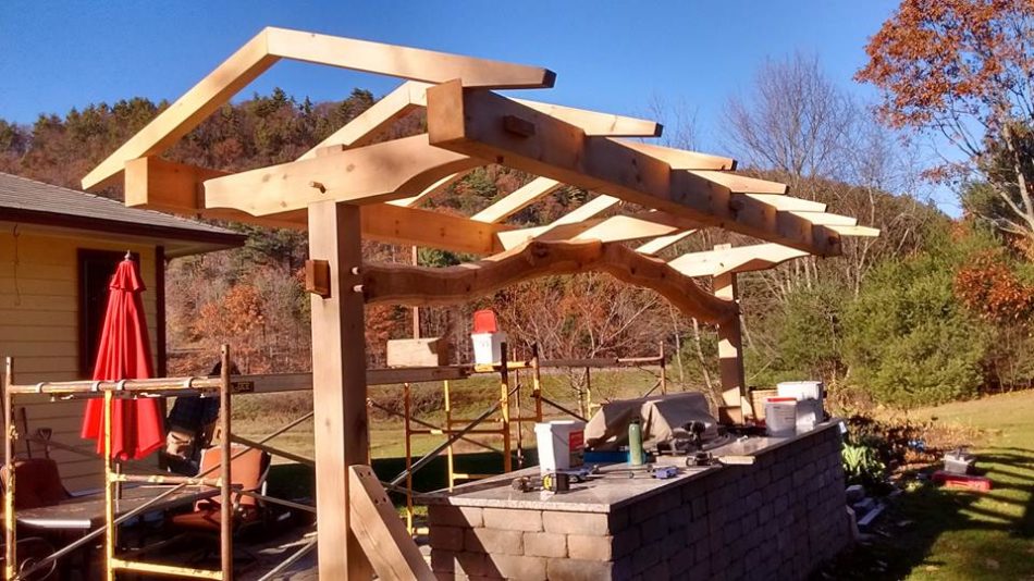 Timber frame which will cover an outdoor kitchen grill and food prep space 