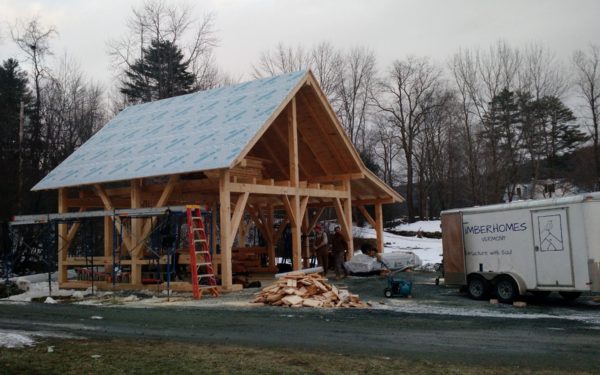 timber frame barn-garage with roof boards