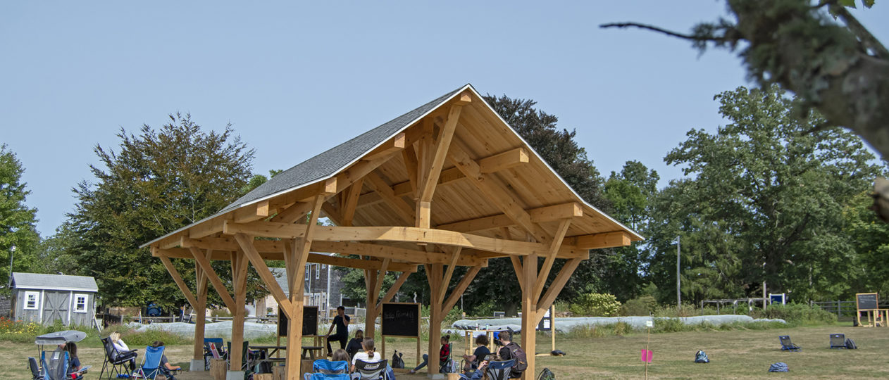A Timber Frame Outdoor Classroom being used during covid to maintain social distancing