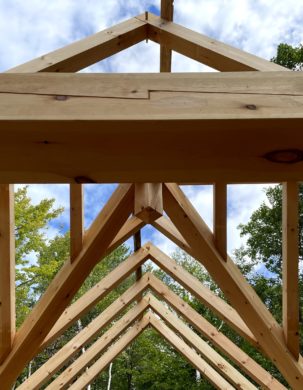 Scarf joint in a timber frame cabin