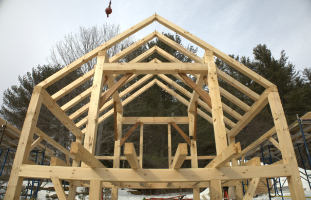 A closer shot of the frame shows a set of joists that will receive a staircase that leads from one part of the barn to another