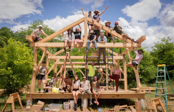Workshop participants atop the hand cut poplar timber frame structure