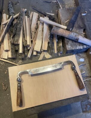 A woodworker's tool called a drawknife.