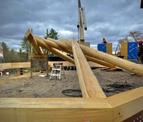 Six of ten rafters that are part of a reciprocating roof are installed.