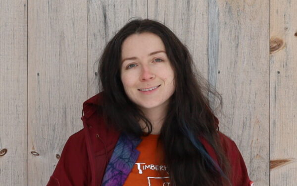 A bio photo of Rose Ayala, who is a project developer at TimberHomes Vermont