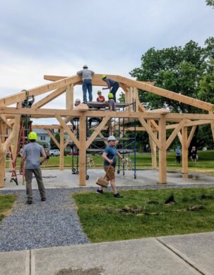 volunteers setting rafters